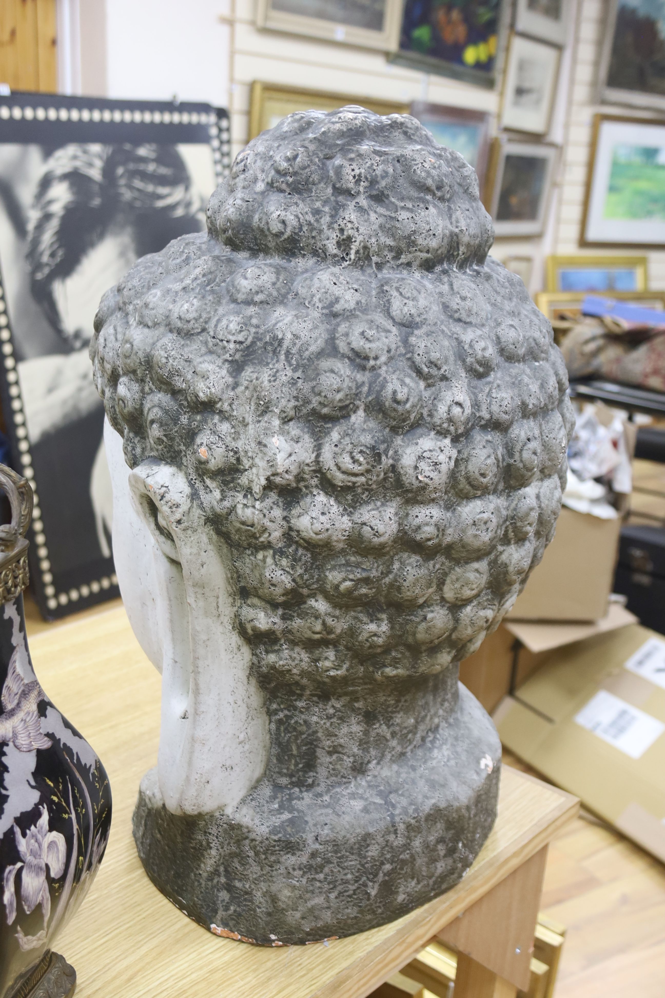 A large white painted terracotta Buddha head, height 57cm